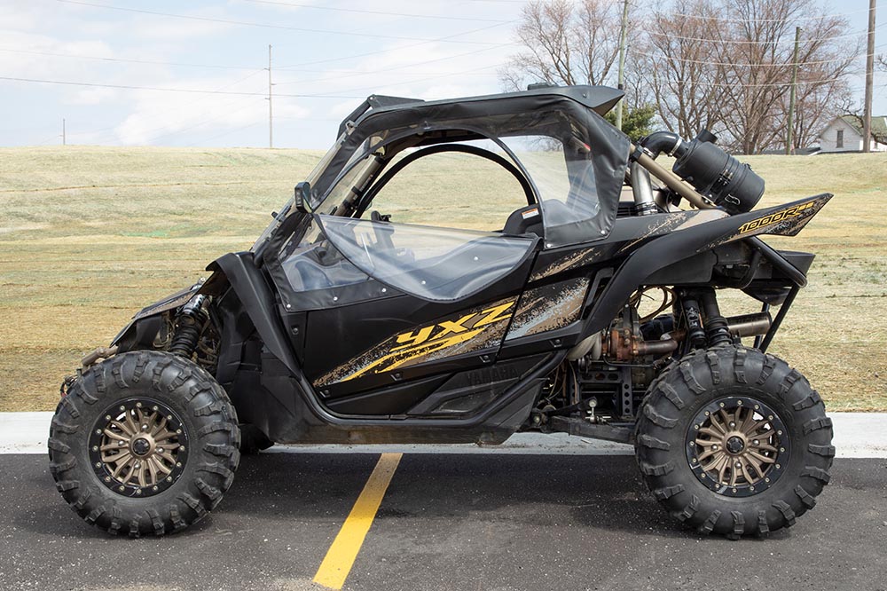 Our UTV side windows can unzip to let a breeze in.